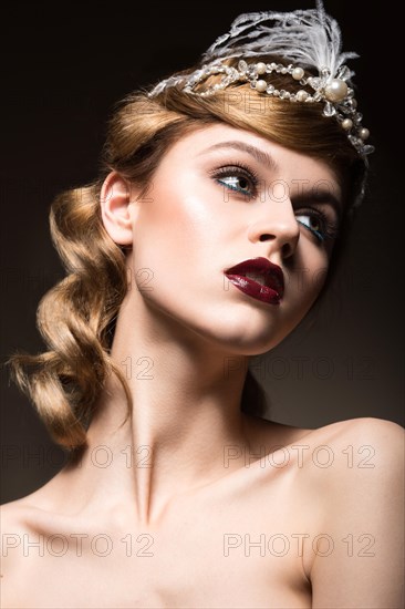 Portrait of elegant retro woman with beautiful hair and dark lips. Beauty face. Picture taken in the studio