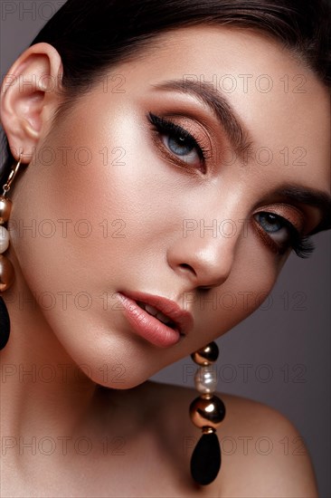 Beautiful girl with classic make up. Beauty face. Photos shot in studio