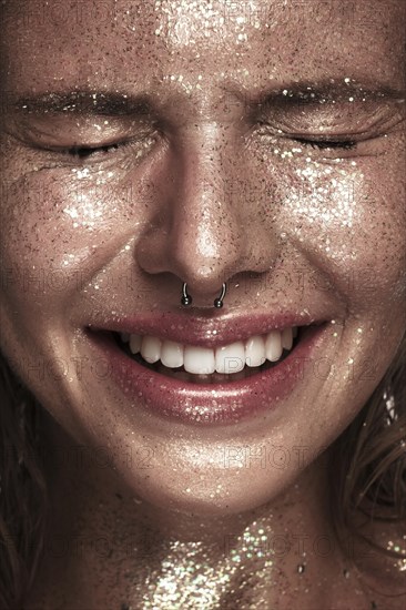 Portrait of a girl with emotion on her face. Photo taken in studio