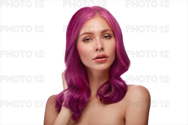 Beautiful girl with multi-colored hair and classic make-up and hairstyle. Beauty face. Photo taken in the studio