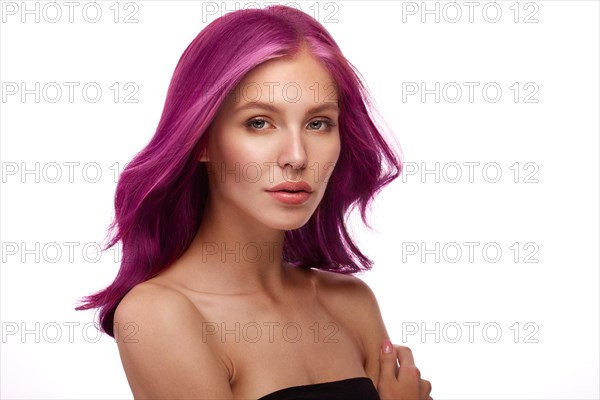 Beautiful girl with multi-colored hair and classic make-up and hairstyle. Beauty face. Photo taken in the studio