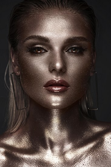 Portrait of beautiful woman with art glitter makeup on her face. Glitter Face