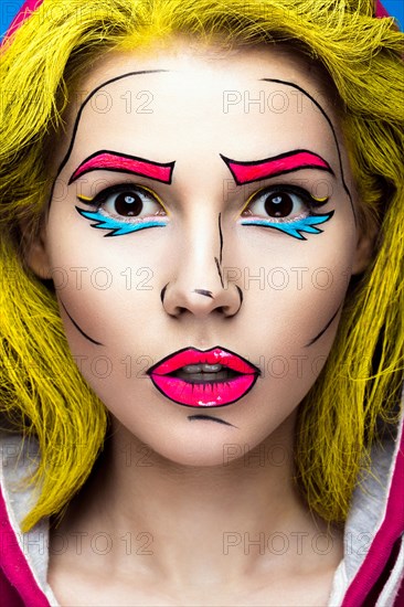Photo of surprised young woman with professional comic pop art make-up. Creative beauty style. Photos shot in studio