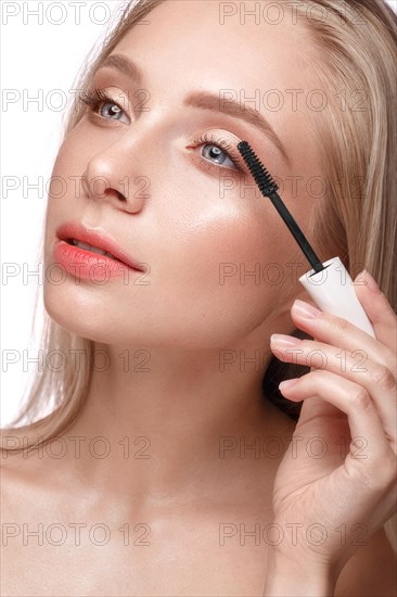 Beautiful young girl with a light natural make-up