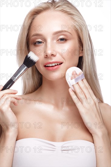 Beautiful young girl with a light natural make-up