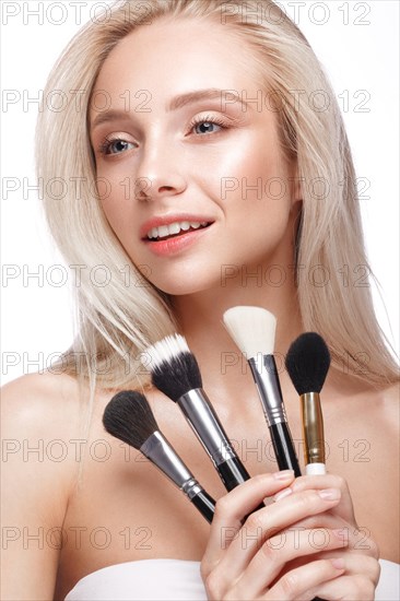 Beautiful young girl with a light natural make-up