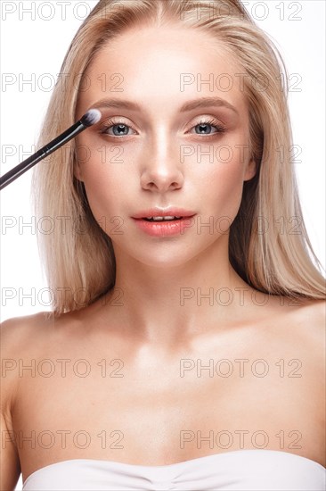 Beautiful young girl with a light natural make-up