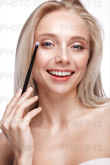 Beautiful young girl with a light natural make-up