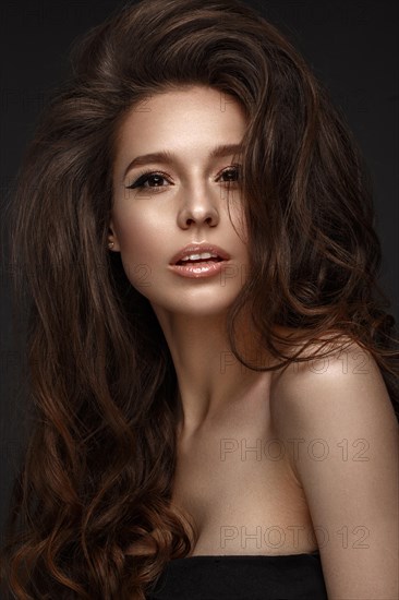 Beautiful brunette model with volume curls