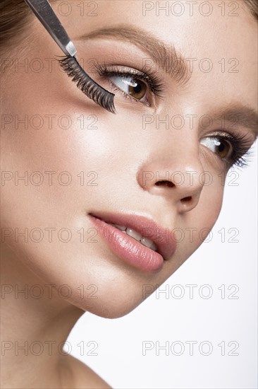 Beautiful young girl with a light natural make-up