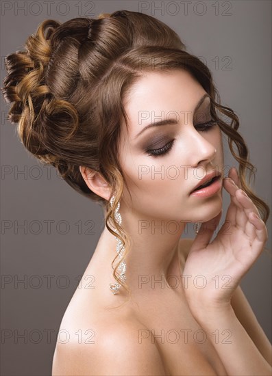 Portrait of a beautiful woman in the image of the bride
