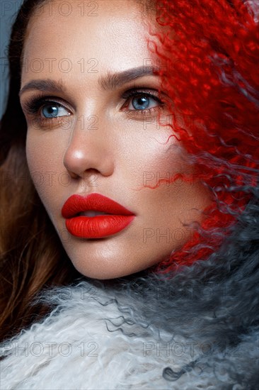 Beautiful woman with classic holiday make-up