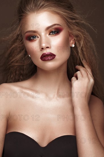 Beautiful blond model with curls