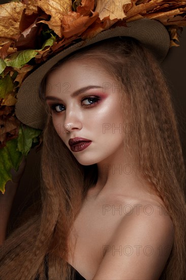 Beautiful blond model autumn hat with curls