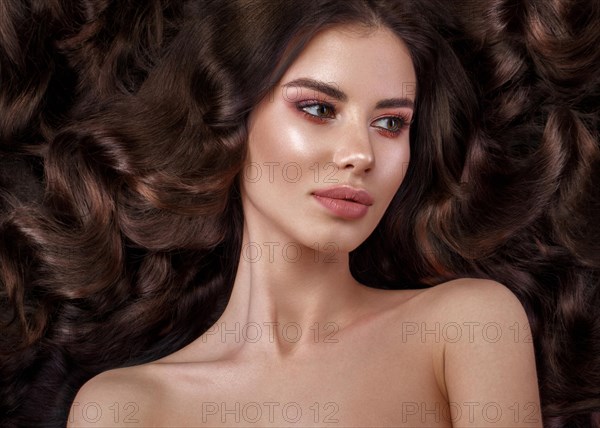 Beautiful brunette model with curls