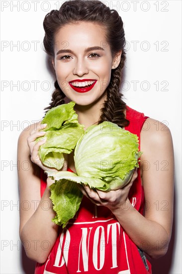 Daring funny girl with braids and red lips