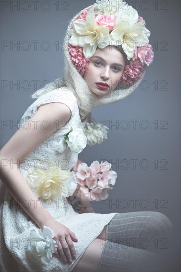 Beautiful girl in a headscarf in the Russian style