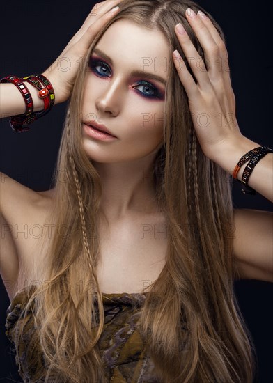 Beautiful fashion girl with bracelets boho style. Beauty face