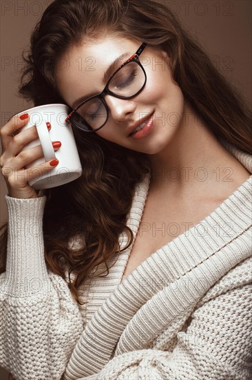 Beautiful girl in stylish clothes with glasses for vision. Beauty face. Photo taken in the studio