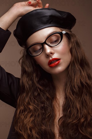 Beautiful girl in stylish clothes with glasses for vision. Beauty face. Photo taken in the studio