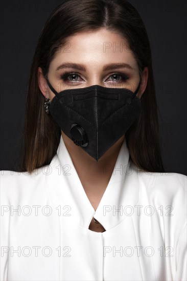 Manicurist in working form in black mask.. Nail photo content