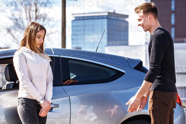 The driver is an auto school instructor and a female student on an examination car. Lesson at the circuit