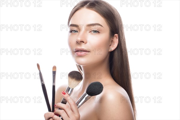 Beautiful young girl with a light natural make-up