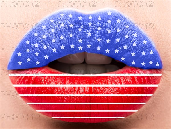 Female lips close up with a picture of the flag of United States of America