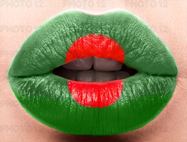 Female lips close up with a picture of the flag of Bangladesh. red