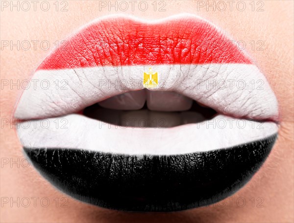 Female lips close up with a picture of the flag of Egypt. white