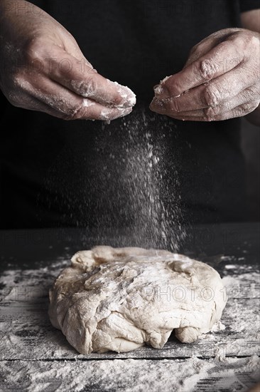 Cooking dough by elderly woman cook hands for homemade pastry bread