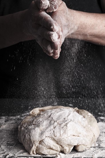 Cooking dough by elderly woman cook hands for homemade pastry bread