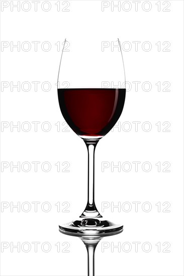 Red wine in a glass isolated on white background