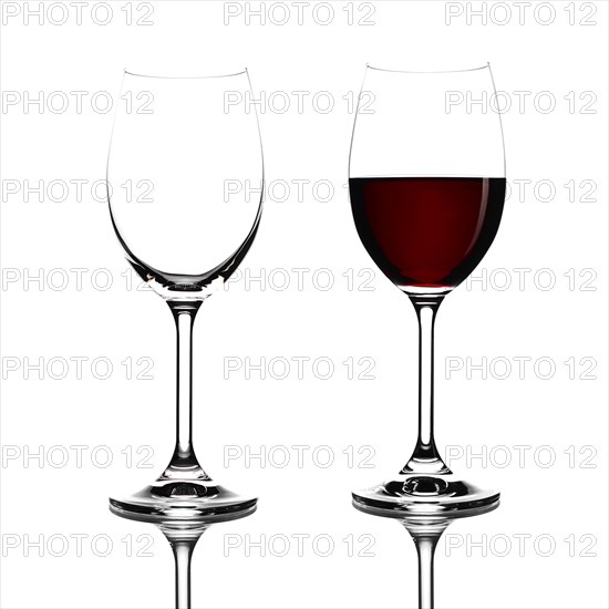 Red wine in a glass isolated on white background