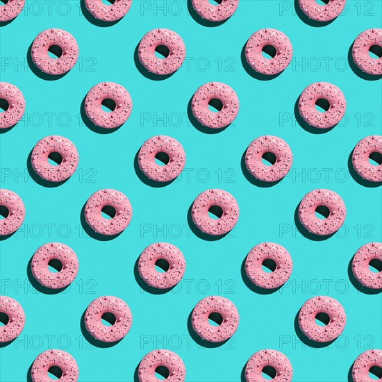 Sweet donuts pattern on a blue background
