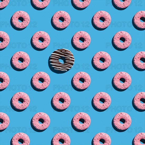 Sweet donuts pattern on a blue background