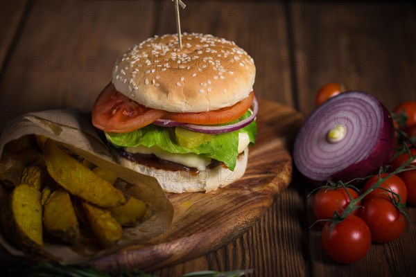 Large appetizing burger with beef