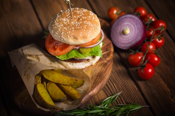 Large appetizing burger with beef