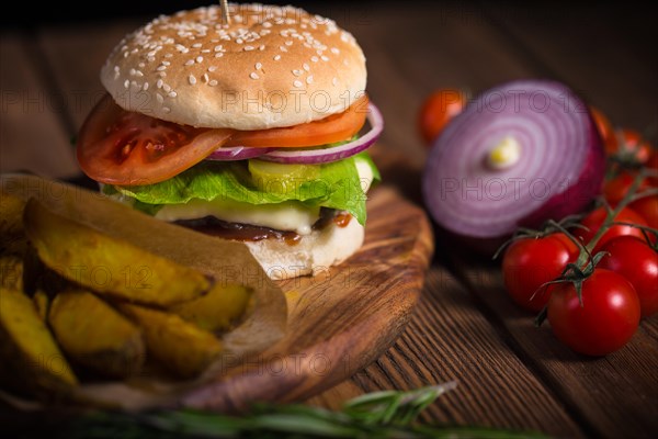 Large appetizing burger with beef