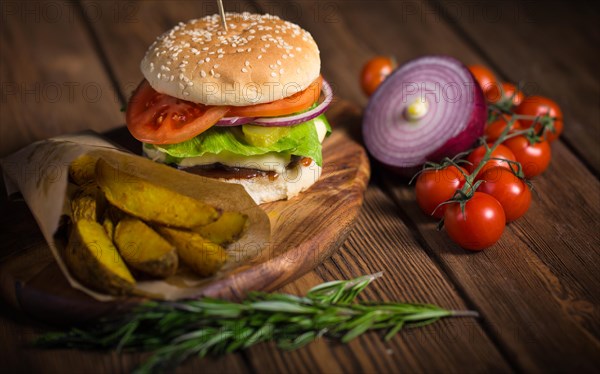 Large appetizing burger with beef