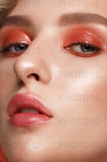 Beautiful blonde girl with gentle make-up. Beauty face. Photos shot in the studio