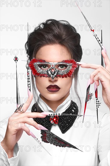 Portrait of a beautiful woman with art make-up in glamorous style