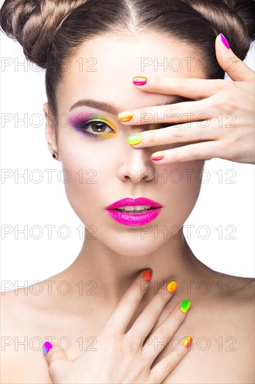 Beautiful girl in pink sunglasses with bright makeup and colorful nails. Beauty face. Picture taken in the studio on a white background