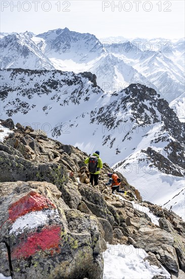 Mountaineers at the summit of the Sulzkogel