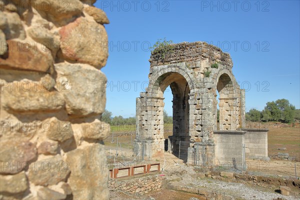 Roman excavation site Ciudad Romana de Caparra with archway near Oliva de Plasencia