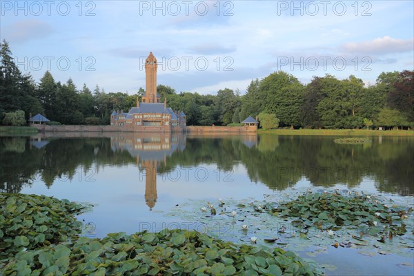 Jachthuis Sint Hubertus built 1915 on the lake with pond roses