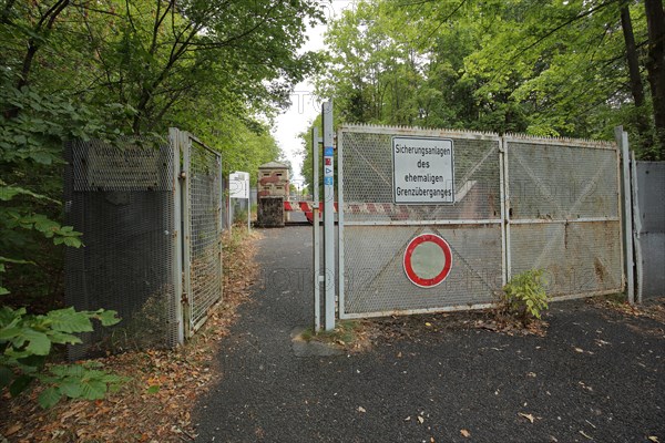 Inner German border crossing to the former GDR and security installation with gate and fence