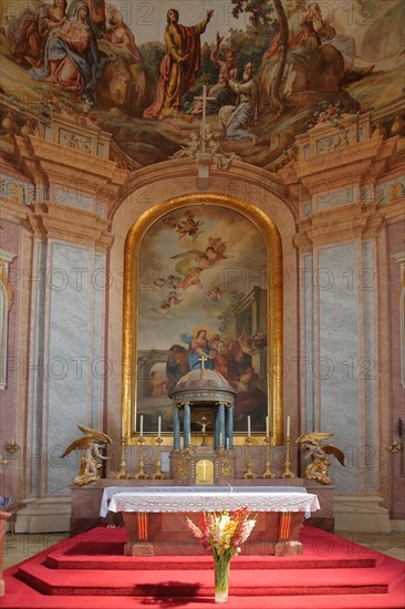 Interior photograph of the chancel with ceiling painting and decorations of the baroque Haydnkirche