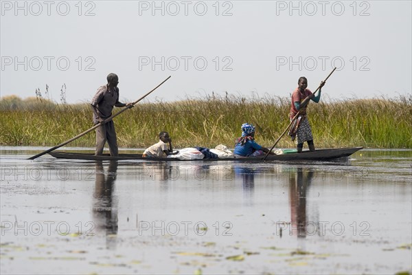 Local family in canoe