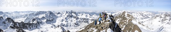 Mountaineers at the summit of the Sulzkogel